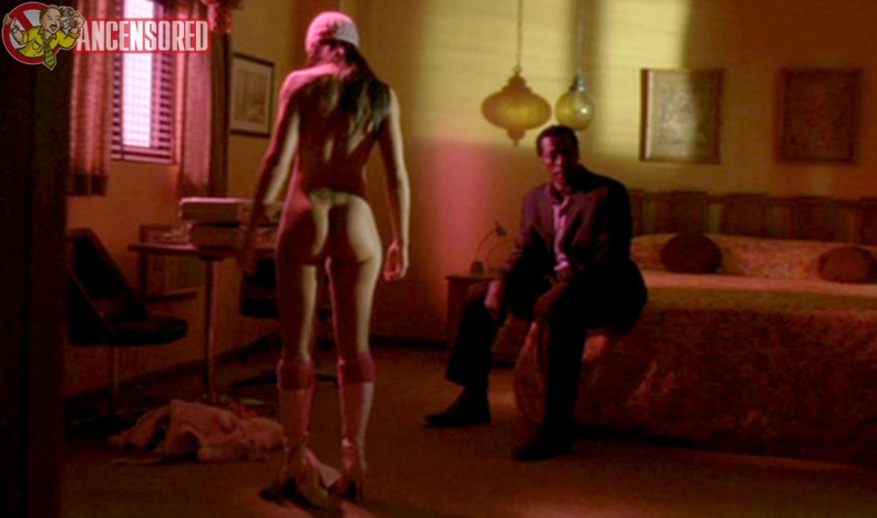 Jackie Quinones in a short skirt breasts