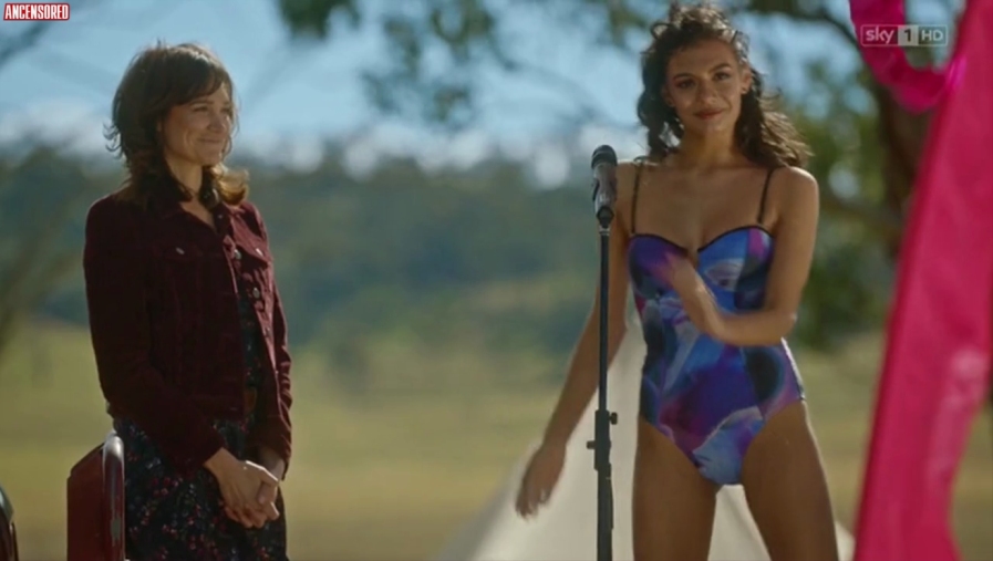 Madeleine Madden in a short skirt breasts