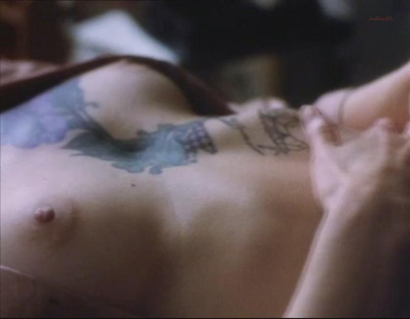 Maud Adams breasts